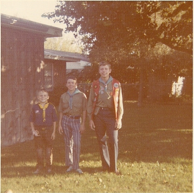Terry Fossum and his brothers Mike and Greg in their Scout uniforms